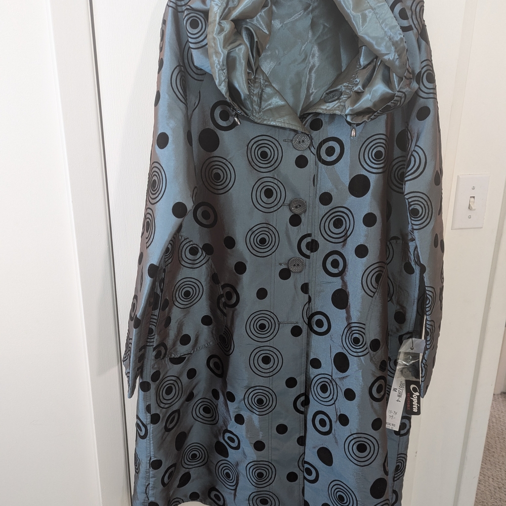 Blue and Black Water-Resistant Cape with Bold Pattern